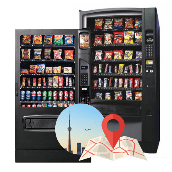 A pair of black snack and drink vending machines filled with chips, chocolate bars, and canned beverages, placed side by side. In front of them is a small graphic showing the Toronto skyline with a red location pin over a folded map.